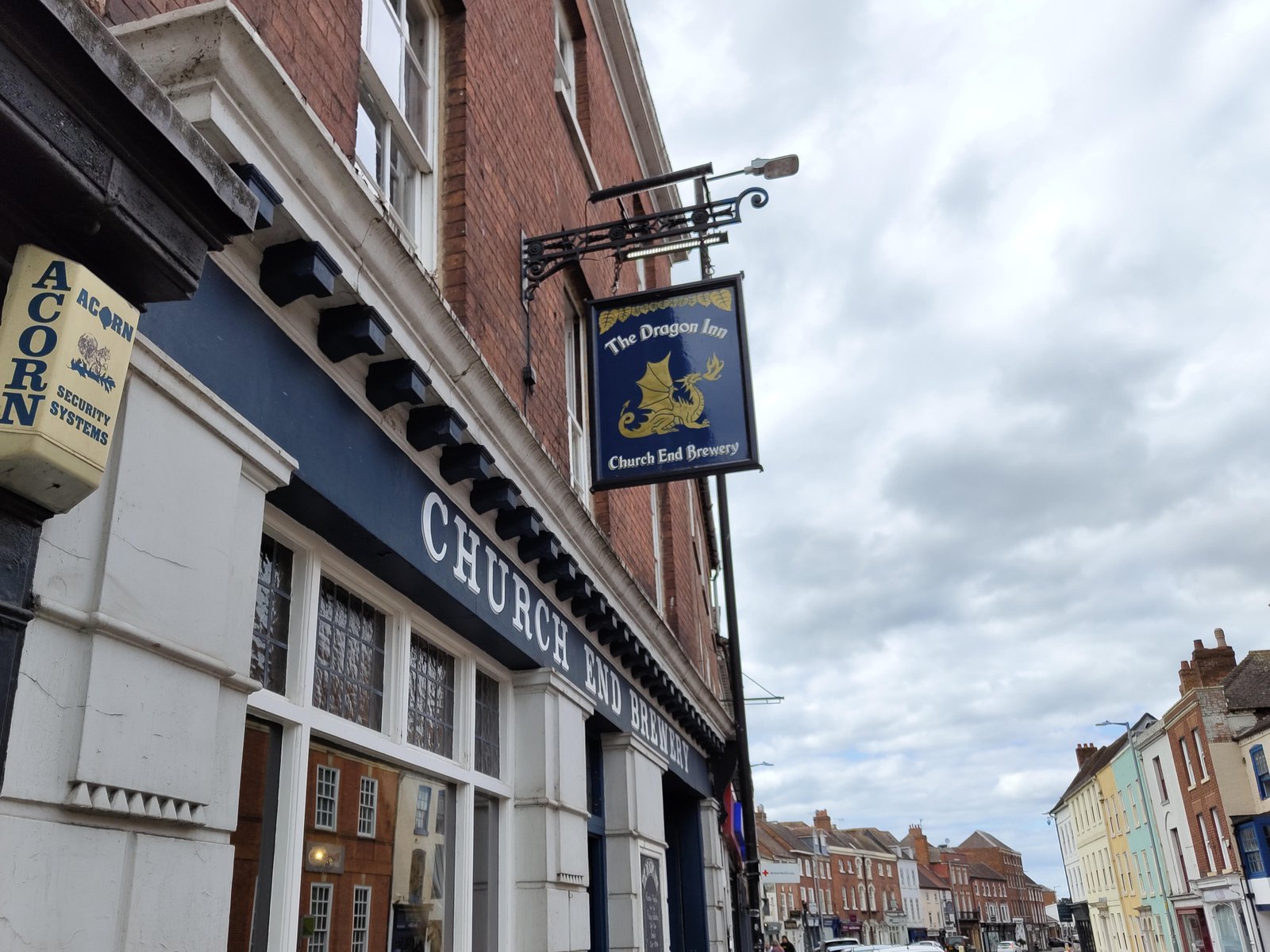 The Dragon Inn pub sign in Worcester, the venue for the party's weekly meetings